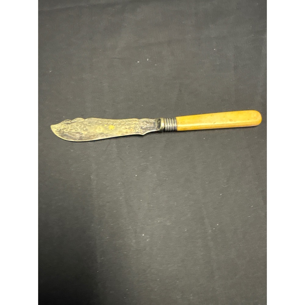 Antique Ornate Etched Butter Knife Scalloped Blade Butterscotch Handle 7.75 in
